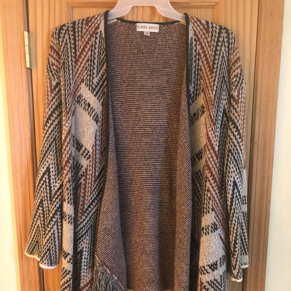 Soft & stylish sweater. Fringe on front.